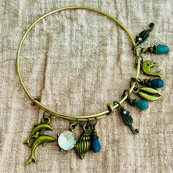 Jewelry - Gold Charm Bracelet with Blue Accents